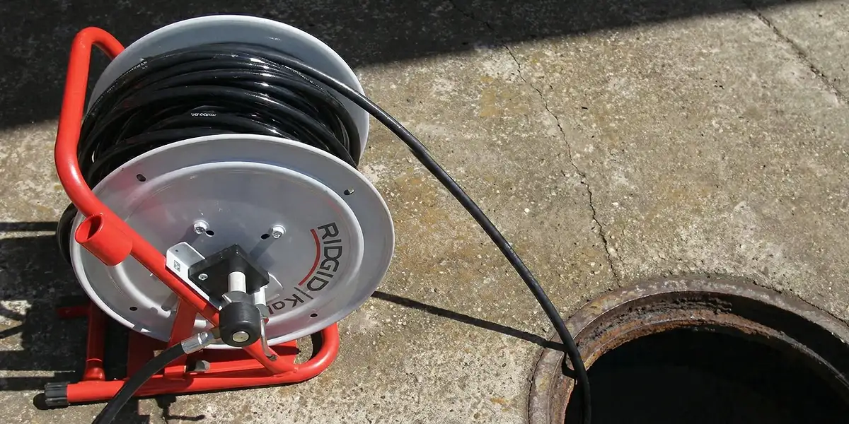 sewer rodding equipment prepared to clear clogged sewer lines in Chandler, AZ